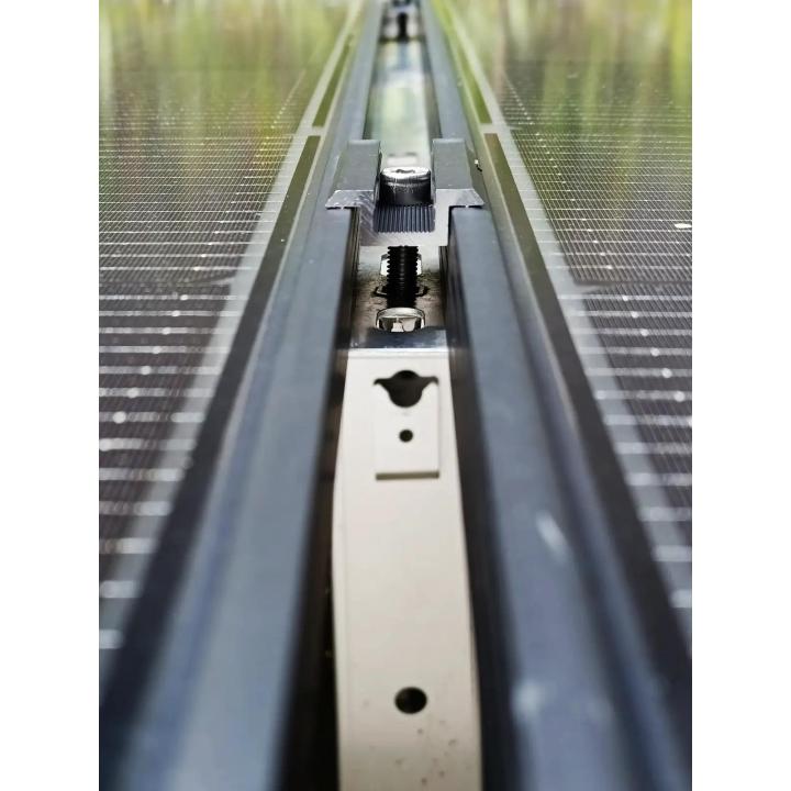 Soporte central de 28-50 mm: fijación del panel al riel